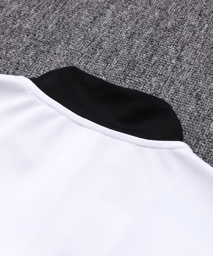 Manchester United Schwarzer und weißer Trainingsanzug