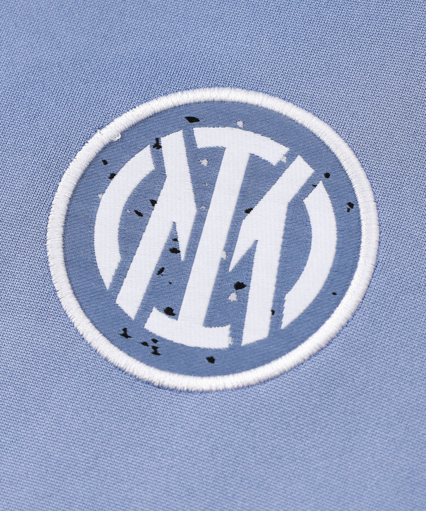 طقم رياضي أزرق فاتح وبرتقالي من إنتر ميلان