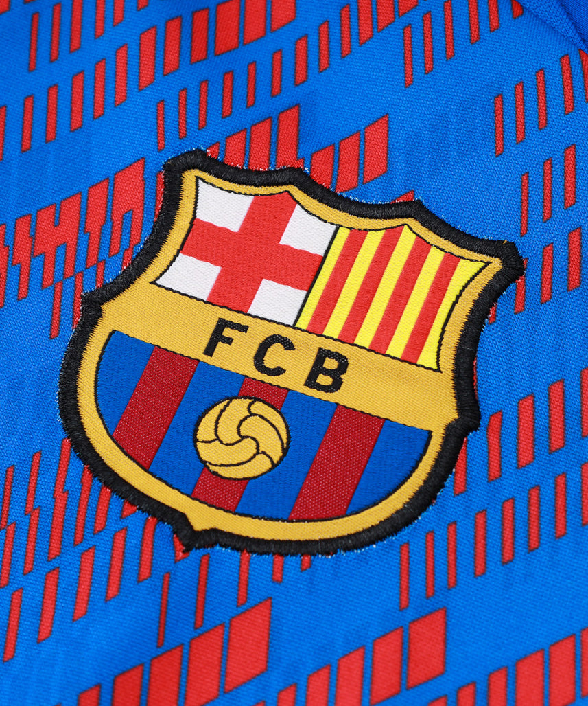 بدلة رياضية زرقاء داكنة وزرقاء من نادي برشلونة