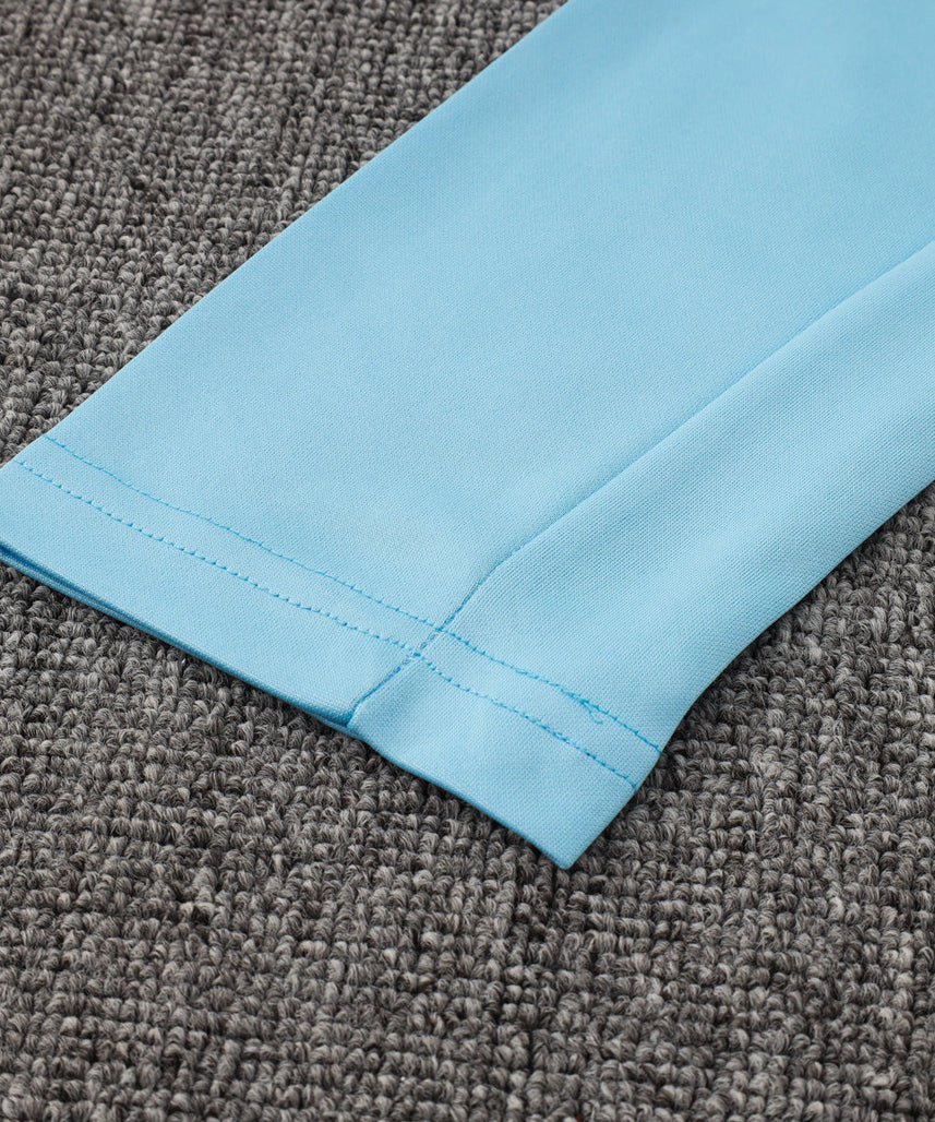 طقم رياضي أبيض وأزرق لنادي مانشستر سيتي