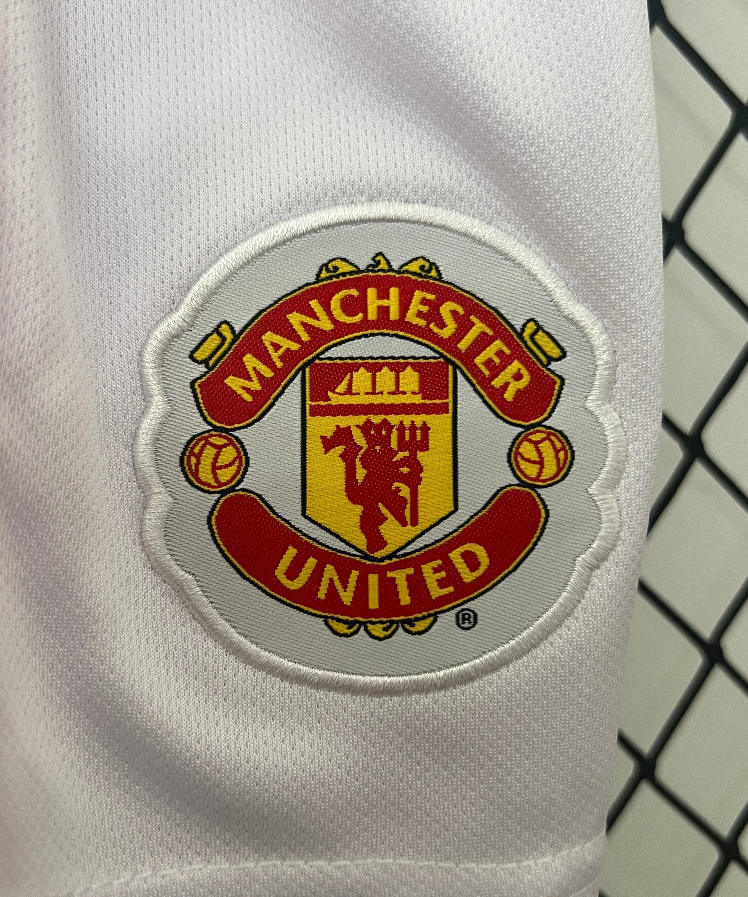 Camiseta retro de local Manchester United 09/10 para niños